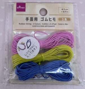 ピンク、イエロー、ブルーのゴム紐